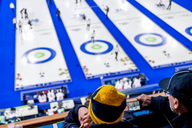 260217 Fans of Sweden watch biathlete Sebastian Samuelsson compete in men s relay on a mobile phone while attending a women s round robin curling match between Sweden and Canada during day 11 of the 2026 Winter Olympics on February 17, 2026 in Cortina. Photo: Jon Olav Nesvold BILDBYRAN COP 217 JE0123 curling Olympic Games, Olympische Spiele, Olympia, OS olympics winter olympics os ol olympiska spel vinter-os olympiske leker milano cortina 2026 milan cortina 2026 milano cortina 2026 olympic games milano cortina 2026 winter olympic games milano cortina-os milano cortina-ol vinter-ol 11 bbeng kanada sverige dam *** 260217 Fans of Sweden watch biathlete Sebastian Samuelsson compete in men s relay on a mobile phone while attending a women s round robin curling match between Sweden and Canada during day 11 of the 2026 Winter Olympics on February 17, 2026 in Cortina Photo Jon Olav Nesvold BILDBYRAN COP 217 JE0123 curling olympic games olympics winter olympics os ol olympiska spel vinter os olympiske leker milano cortina 2026 milan cortina 2026 milano cortina 2026 olympic games milano cortina 2026 winter olympic games milano cortina os milano cortina ol vinter ol 11 bbeng kanada sverige dam  Copyright: JONxOLAVxNESVOLD BB260217JE051