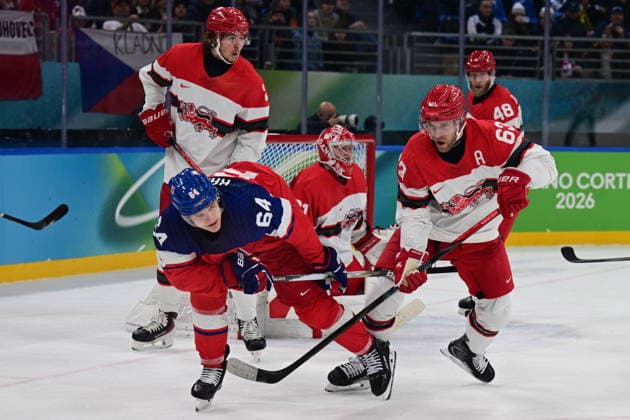 XXV Winter Olympic Games, Olympische Spiele, Olympia, OS in Milan, Italy, on February 17, 2026. Men s Ice hockey, Eishockey preliminary round playoffs, Czechia - Denmark. From left: David Kampf of the Czech Republic, Patrick Russell of Denmark. (CTKxPhoto MichalxKamaryt) CTKPhotoP2026021707054  CTKPhotoP2026021707054