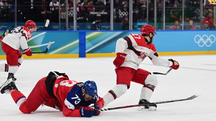 XXV Winter Olympic Games, Olympische Spiele, Olympia, OS in Milan, Italy, on February 17, 2026. Men s Ice hockey, Eishockey preliminary round playoffs, Czechia - Denmark. From left: Ondrej Kase of the Czech Republic, Oliver Bjorkstrand of Denmark. (CTKxPhoto MichalxKamaryt) CTKPhotoP2026021707114  CTKPhotoP2026021707114