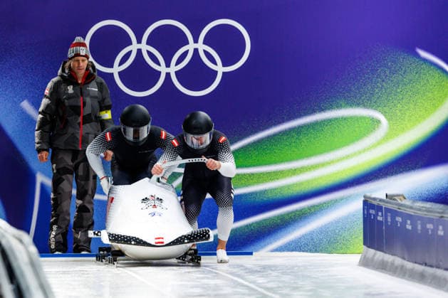 OLYMPICS - Winter Olympic Games, Olympische Spiele, Olympia, OS Milano Cortina 2026 CORTINA D AMPEZZO,ITALY,17.FEB.26 - OLYMPICS, BOBSLEIGH - Winter Olympic Games Milano Cortina 2026, 2-man, men. Image shows Jakob Mandlbauera and Daiyehan-Obafemi Nichols-Bardi (AUT).  GEPAxpictures xMaticxKlansek