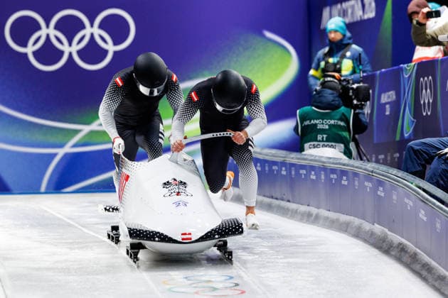 OLYMPICS - Winter Olympic Games, Olympische Spiele, Olympia, OS Milano Cortina 2026 CORTINA D AMPEZZO,ITALY,17.FEB.26 - OLYMPICS, BOBSLEIGH - Winter Olympic Games Milano Cortina 2026, 2-man, men. Image shows Jakob Mandlbauera and Daiyehan-Obafemi Nichols-Bardi (AUT).  GEPAxpictures xMaticxKlansek