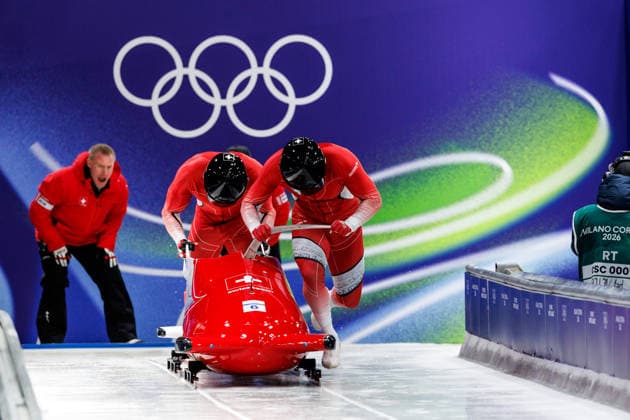 OLYMPICS - Winter Olympic Games, Olympische Spiele, Olympia, OS Milano Cortina 2026 CORTINA D AMPEZZO,ITALY,17.FEB.26 - OLYMPICS, BOBSLEIGH - Winter Olympic Games Milano Cortina 2026, 2-man, men. Image shows Michael Vogt and Amadou David Ndiaye (SUI).  GEPAxpictures xMaticxKlansek
