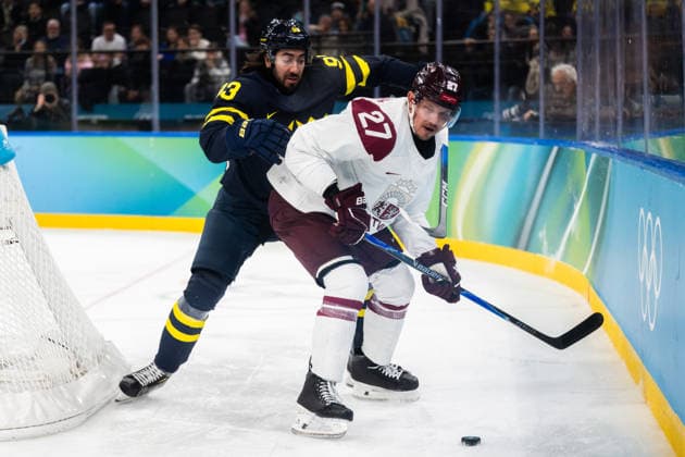 260217 Mika Zibanejad of Sweden and Oskars Cibulskis of Latvia in the men s Ice hockey, Eishockey qualification playoffs game between Sweden and Latvia during day 11 of the 2026 Winter Olympics on February 17, 2026 in Milan. Photo: Emma Wallskog BILDBYRAN kod EW CS0885 ishockey ice hockey Olympic Games, Olympische Spiele, Olympia, OS olympics winter olympics os ol olympiska spel vinter-os olympiske leker milano cortina 2026 milan cortina 2026 milano cortina 2026 olympic games milano cortina 2026 winter olympic games milano cortina-os milano cortina-ol vinter-ol 11 bbeng sverige sweden latvia lettland *** 260217 Mika Zibanejad of Sweden and Oskars Cibulskis of Latvia in the men s ice hockey qualification playoffs game between Sweden and Latvia during day 11 of the 2026 Winter Olympics on February 17, 2026 in Milan Photo Emma Wallskog BILDBYRAN kod EW CS0885 ishockey ice hockey olympic games olympics winter olympics os ol olympiska spel vinter os olympiske leker milano cortina 2026 milan cortina 2026 milano cortina 2026 olympic games milano cortina 2026 winter olympic games milano cortina os milano cortina ol vinter ol 11 bbeng sverige sweden latvia lettland  Copyright: EMMAxWALLSKOG BB260217EW010