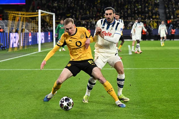 Maximilian Beier Borussia Dortmund and Davide Zappacosta Atalanta Bergamo in a duel during the UEFA Champions League 2025 26, Play offs, first leg match between Borussia Dortmund and Atalanta Bergamo, BVB Stadion on February 17, 2026 in Dortmund, Germany, Germany Photo by Ralf Treese DeFodi Images Maximilian Beier Borussia Dortmund and Davide Zappacosta Atalanta Bergamo battle for the ball during the UEFA Champions League 2025 26 League Knockout Play off First Leg match between Borussia Dortmund and Atalanta BC at BVB Stadion Dortmund on February 17, 2026 in Dortmund, Germany Photo by Ralf Treese DeFodi Images