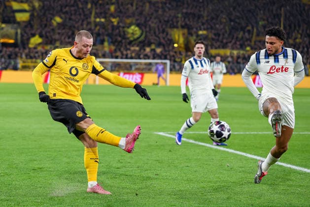 17 02 2026, Football, UEFA Champions League, Borussia Dortmund Atalanta Bergamo, BVB Stadion, Play Offs first leg, Season 2025 2026 Julian Ryerson BVB 26 Plays a cross into the penalty area to Serhou Guirassy BVB 09 Regulations prohibit any use of photographs as image sequences and or quasi video North Rhine-Westphalia Germany