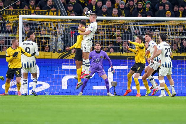 17 02 2026, Football, UEFA Champions League, Borussia Dortmund Atalanta Bergamo, BVB Stadion, Play Offs first leg, Season 2025 2026 Jobe Bellingham BVB 07 in duel against Mario Pasalic Atalanta Bergamo 08 header duel in penalty area Regulations prohibit any use of photographs as image sequences and or quasi video Nordrhein Westfalen Germany