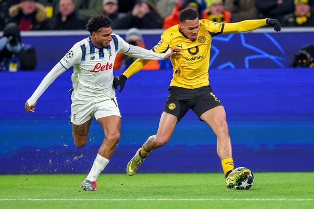 17 02 2026, Football, UEFA Champions League, Borussia Dortmund Atalanta Bergamo, BVB Stadion, Play Offs first leg, Season 2025 2026 Ederson dos Santos Lourenco da Silva Atalanta Bergamo 13 in duel against Felix Nmecha BVB 08 Regulations prohibit any use of photographs as image sequences and or quasi video Nordrhein Westfalen Germany