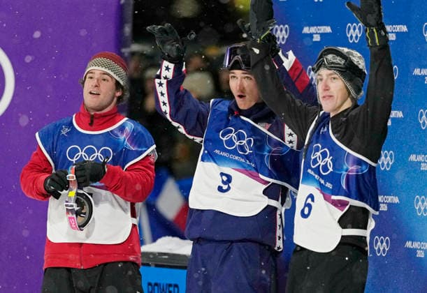 Gold medalist Tormod Frostad of Norway (R), silver medalist Mac Forehand of the United States (C), and bronze medalist Matej Svancer of Austrian react in the finish area after seeing the final scores in the Men s Freestyle Skiing Big Air competition at the Milano Cortina 2026 Winter Olympic Games, Olympische Spiele, Olympia, OS in Livigno, Italy, on Tuesday, February 17, 2026.  OLY20260217806 BOBxSTRONG