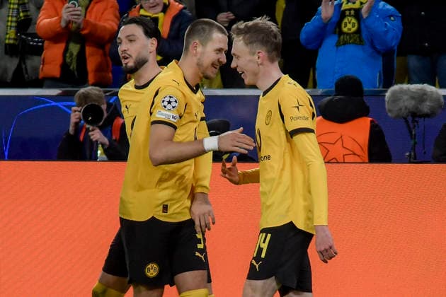 Maximilian Beier Dortmund 14 celebrates after scoring the 2-0 goal with Waldemar Anton Dortmund 3 Ramy Bensebaini Dortmund 5 17 02 2026 Soccer, Champions League, Borussia Dortmund vs Atalanta Bergamo , Signal Iduna Park, Dortmund, Copyright: xpepphotox xHorstxMauelshagenx pep00321, pep_20260217_hm_283307