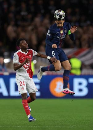 Monaco, Monaco, 17th February 2026. Marquinhos of PSG heads clear from Simon Adingra of AS Monaco during the AS Monaco vs Paris Saint Germain UEFA Champions League match at Stade Louis II, Monaco. Picture credit should read: Jonathan Moscrop Sportimage EDITORIAL USE ONLY. No use with unauthorised audio, video, data, fixture lists, club league logos or live services. Online in-match use limited to 120 images, no video emulation. No use in betting, games or single club league player publications. SPI_017_MONACO_PSG_UCL_ SPI-4526-0017