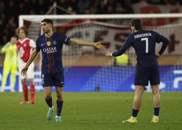 CALCIO - UEFA Champions League - AS Monaco vs PSG Achraf Hakimi of FC Paris Saint-Germain and Khvicha Kvaratskhelia of FC Paris Saint-Germain during the Uefa Champions League, season 2025 2026, first leg play-off, football match between AS Monaco and FC Paris Saint-Germain on 17 February 2026 at Stade Louis II, Monaco. Photo Nderim Kaceli Monaco  Copyright: xIPAxSport ABACAx