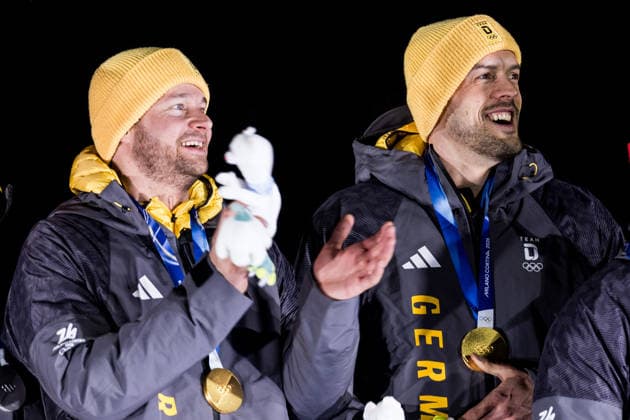 CORTINA, ITALY - FEBRUARY 17: Gold medalists Johannes Lochner and Georg Fleischhauer (Germany) during the Bobsleigh 2-man medal ceremony at the Milano Cortina 2026 Olympics at Cortina Sliding Centre on day 11 of the Milano Cortina 2026 Olympics on February 17, 2026 in Cortina, Italy. Editorial use only. Italy Copyright: xSteffiexWunderlx