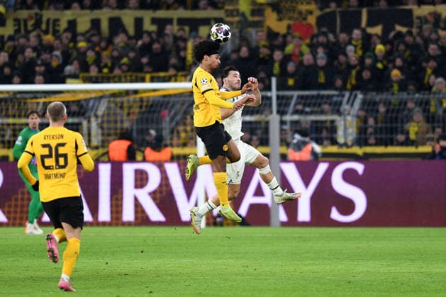 Karim Adeyemi Borussia Dortmund and Sead Kolasinac Atalanta Bergamo in a duel during the UEFA Champions League 2025 26, Play offs, first leg match between Borussia Dortmund and Atalanta Bergamo, BVB Stadion on February 17, 2026 in Dortmund, Germany, Germany Photo by Ralf Treese DeFodi Images Karim Adeyemi Borussia Dortmund and Sead Kolasinac Atalanta Bergamo battle for the ball during the UEFA Champions League 2025 26 League Knockout Play off First Leg match between Borussia Dortmund and Atalanta BC at BVB Stadion Dortmund on February 17, 2026 in Dortmund, Germany Photo by Ralf Treese DeFodi Images