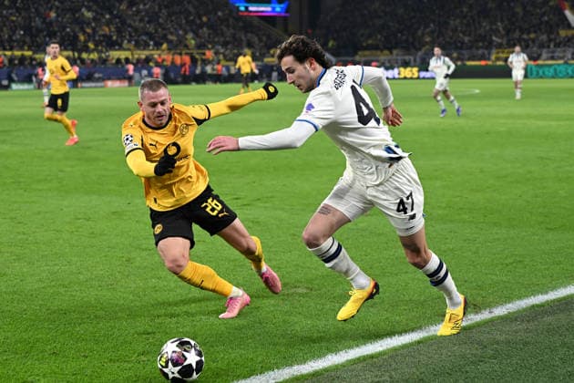 Julian Ryerson Borussia Dortmund and Lorenzo Bernasconi Atalanta Bergamo in a duel during the UEFA Champions League 2025 26, Play offs, first leg match between Borussia Dortmund and Atalanta Bergamo, BVB Stadion on February 17, 2026 in Dortmund, Germany, Germany Photo by Ralf Treese DeFodi Images Julian Ryerson Borussia Dortmund and Lorenzo Bernasconi Atalanta Bergamo battle for the ball during the UEFA Champions League 2025 26 League Knockout Play off First Leg match between Borussia Dortmund and Atalanta BC at BVB Stadion Dortmund on February 17, 2026 in Dortmund, Germany Photo by Ralf Treese DeFodi Images