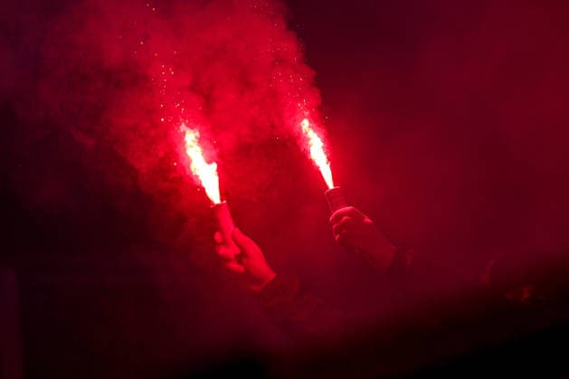 17 02 2026, Football, UEFA Champions League, Borussia Dortmund Atalanta Bergamo, BVB Stadion, Play Offs first leg, Season 2025 2026 Atalanta fan ignite pyrotechnics Benaglisches Feuer auf der Tribüne Gästeblock Regulations prohibit any use of photographs as image sequences and or quasi video Nordrhein Westfalen Germany