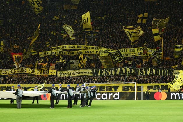 Dortmund, Germany, 17 02 26, BVB fans show a banner during the Champions League playoff match between Borussia Dortmund Atalanta Bergamo at Signal Iduna Park in Dortmund Photo by Joachim Bywaletz DFB DFL REGULATIONS PROHIBIT ANY USE OF PHOTOGRAPHS AS IMAGE SEQUENCES AND OR QUASI VIDEO Copyright: JoachimxBywaletz xJB-Sportfoto