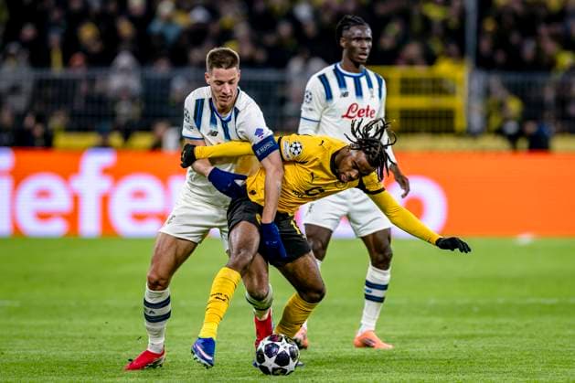 Atalanta midfielder Mario Pasalic, Borussia Dortmund midfielder Carney Chukwuemeka, during the match Borussia Dortmund vs Atalanta BC at the BVB Stadion Dortmund for the Champions League KO play offs 1st leg season 2025 2026 in DORTMUND, Germany on 17 february 2026 Photo by Stefan Koops EYE4IMAGES DeFodi Images