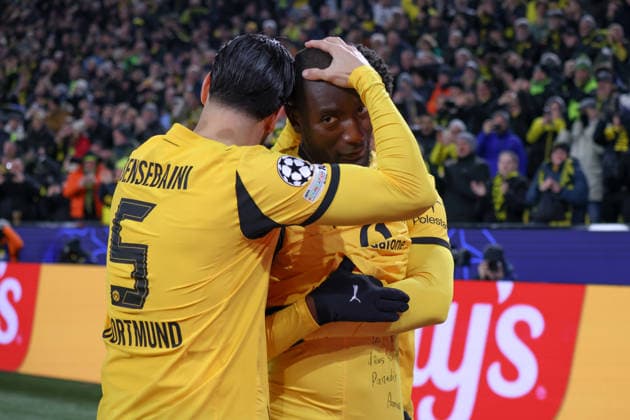 Dortmund, Germany 17 February 2026 UEFA Champions League 2025 2026 Borussia Dortmund vs Atalanta Bergamo In the picture Goalscorer Serhou Guirassy BVB scores the goal to make it 1-0 for Dortmund and Ramy Bensebaini BVB gives him a big hug Copyright: HMBxMedia MadeleinexFantini