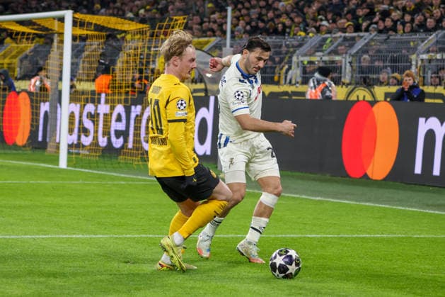 Dortmund, Germany February 17, 2026 UEFA Champions League 2025 2026 Borussia Dortmund vs Atalanta Bergamo In the picture from left in the duel Julian Brandt BVB and Sead Kolasinac Atalanta Bergamo Copyright: HMBxMedia MadeleinexFantini