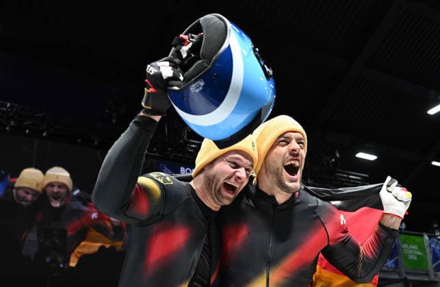 (260218) -- CORTINA D AMPEZZO, Feb. 18, 2026 -- Johannes Lochner (L) Georg Fleischhauer of Germany celebrate after winning the Bobsleigh 2-man at the Milan-Cortina 2026 Olympic Winter games, Winterspiele,Spiele, Summer games in Cortina D Ampezzo, Italy, Feb. 17, 2026. ) (MICO2026)ITALY-CORTINA D AMPEZZO-OLYMPIC WINTER GAMES-BOBSLEIGH-2-MAN LianxYi 