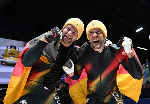 (260218) -- CORTINA D AMPEZZO, Feb. 18, 2026 -- Johannes Lochner (L) Georg Fleischhauer of Germany celebrate after winning the Bobsleigh 2-man at the Milan-Cortina 2026 Olympic Winter games, Winterspiele,Spiele, Summer games in Cortina D Ampezzo, Italy, Feb. 17, 2026. ) (MICO2026)ITALY-CORTINA D AMPEZZO-OLYMPIC WINTER GAMES-BOBSLEIGH-2-MAN LianxYi 