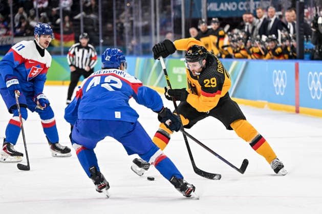 18 02 2026, Milano, Santa Giulia Ice hockey, Eishockey Arena, Winter Olympics: Slovakia - Germany (Ice Hockey), Leon Draisaitl of Germany against Martin Fehervary of Slovakia Milano Santa Giulia Ice Hockey Arena Lombardy Italy *** 18 02 2026, Milano, Santa Giulia Ice Hockey Arena, Winter Olympics Slovakia Germany Ice Hockey , Leon Draisaitl of Germany against Martin Fehervary of Slovakia Milano Santa Giulia Ice Hockey Arena Lombardy Italy Copyright: xJustPictures.ch AndreaxBrancax jp-en-AnBr-AB-AAB_408518022026