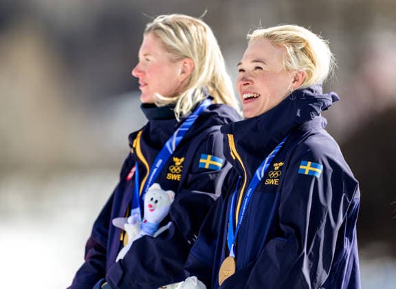 260218 Maja Dahlqvist of Sweden and Jonna Sundling of Sweden celebrate first place in the women s free technique team sprint cross-country skiing final during day 12 of the 2026 Winter Olympics on February 18, 2026 in Val di Fiemme. Photo: Maxim Thore BILDBYRAN kod MT MT0993 skidor cross-country skiing langrenn Olympic Games, Olympische Spiele, Olympia, OS olympics winter olympics os ol olympiska spel vinter-os olympiske leker milano cortina 2026 milan cortina 2026 milano cortina 2026 olympic games milano cortina 2026 winter olympic games milano cortina-os milano cortina-ol vinter-ol 12 bbeng teamsprint jubel sweden sverige *** 260218 Maja Dahlqvist of Sweden and Jonna Sundling of Sweden celebrate first place in the women s free technique team sprint cross country skiing final during day 12 of the 2026 Winter Olympics on February 18, 2026 in Val di Fiemme Photo Maxim Thore BILDBYRAN kod MT MT0993 skidor cross country skiing langrenn olympic games olympics winter olympics os ol olympiska spel vinter os olympiske leker milano cortina 2026 milan cortina 2026 milano cortina 2026 olympic games milano cortina 2026 winter olympic games milano cortina os milano cortina ol vinter ol 12 bbeng teamsprint jubel sweden sverige  Copyright: MAXIMxTHORE BB260218MT085