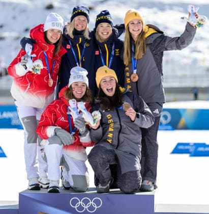 260218 Nadja Kälin and Nadine Faehndrich of Switzerland, Jonna Sundling and Maja Dahlqvist of Sweden and Laura Gimmler and Coletta Rydzek of Germany celebrate on the podium after the women s free technique team sprint cross-country skiing final during day 12 of the 2026 Winter Olympics on February 18, 2026 in Val di Fiemme. Photo: Jon Olav Nesvold BILDBYRAN COP 217 MT0993 skidor cross-country skiing langrenn Olympic Games, Olympische Spiele, Olympia, OS olympics winter olympics os ol olympiska spel vinter-os olympiske leker milano cortina 2026 milan cortina 2026 milano cortina 2026 olympic games milano cortina 2026 winter olympic games milano cortina-os milano cortina-ol vinter-ol 12 bbeng teamsprint jubel sweden sverige *** 260218 Nadja Kälin and Nadine Faehndrich of Switzerland, Jonna Sundling and Maja Dahlqvist of Sweden and Laura Gimmler and Coletta Rydzek of Germany celebrate on the podium after the women s free technique team sprint cross country skiing final during day 12 of the 2026 Winter Olympics on February 18, 2026 in Val di Fiemme Photo Jon Olav Nesvold BILDBYRAN COP 217 MT0993 skidor cross country skiing langrenn olympic games olympics winter olympics os ol olympiska spel vinter os olympiske leker milano cortina 2026 milan cortina 2026 milano cortina 2026 olympic games milano cortina 2026 winter olympic games milano cortina os milano cortina ol vinter ol 12 bbeng teamsprint jubel sweden sverige  Copyright: JONxOLAVxNESVOLD BB260218JE078