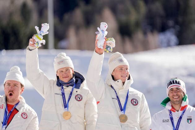 Winter Olympics in Milan Cortina 2026 Val di Fiemme, Italy 20260218. Johannes Hosflot Klaebo from Norway and Einar Hedegart from Norway on the podium after the cross-country team sprint on Lago di Tesero during the Winter Olympics in Milano Cortina 2026. Photo: Terje Pedersen NTB Val di Fiemme Italy EDITORIAL USE ONLY. RESTRICTED USE FOR BETTING COMPANIES Ref:_SPOMch2wAifo-A.jpg *** Winter Olympics in Milan Cortina 2026 Val di Fiemme, Italy 20260218 Johannes Hosflot Klaebo from Norway and Einar Hedegart from Norway on the podium after the cross country team sprint on Lago di Tesero during the Winter Olympics in Milano Cortina 2026 Photo Terje Pedersen NTB Val di Fiemme Italy EDITORIAL USE ONLY RESTRICTED USE FOR BETTING COMPANIES  Copyright: xTerjexPedersenx xNTBx