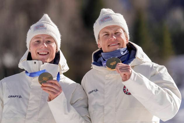 Winter Olympics in Milan Cortina 2026 Val di Fiemme, Italy 20260218. Einar Hedegart and Johannes Hosflot Klaebo from Norway with the gold medals after the cross-country team sprint on Lago di Tesero during the Winter Olympics in Milano Cortina 2026. Photo: Terje Pedersen NTB Val di Fiemme Italy EDITORIAL USE ONLY. RESTRICTED USE FOR BETTING COMPANIES Ref:_SPOJhG15qkTrqQ.jpg *** Winter Olympics in Milan Cortina 2026 Val di Fiemme, Italy 20260218 Einar Hedegart and Johannes Hosflot Klaebo from Norway with the gold medals after the cross country team sprint on Lago di Tesero during the Winter Olympics in Milano Cortina 2026 Photo Terje Pedersen NTB Val di Fiemme Italy EDITORIAL USE ONLY RESTRICTED USE FOR BETTING COMPANIES  Copyright: xTerjexPedersenx xNTBx