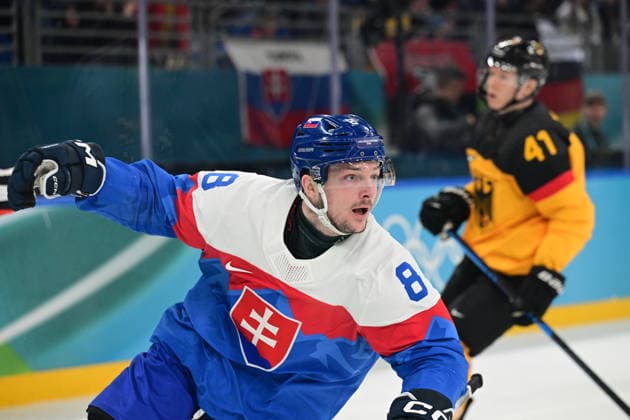 XXV Winter Olympic Games, Olympische Spiele, Olympia, OS in Milan, Italy, on February 18, 2026. Men s Ice hockey, Eishockey preliminary round playoffs, Slovakia - Germany. Oliver Okuliar of Slovakia celebrates a goal, at right is Jonas Muller of Germany. (CTKxPhoto MichalxKamaryt) CTKPhotoP2026021804714  CTKPhotoP2026021804714