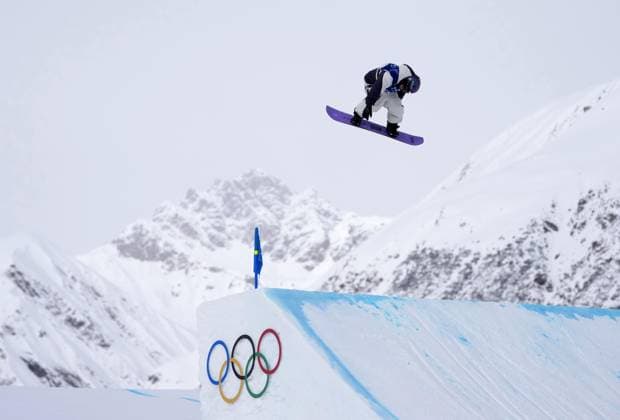 Milan Cortina Olympics: Snowboard Taiga Hasegawa of Japan competes en route to winning the men s snowboard slopestyle silver at the Milan Cortina Olympics on Feb. 18, 2026, at Livigno Snow Park in Livigno, Italy.  A14AA0005300080P