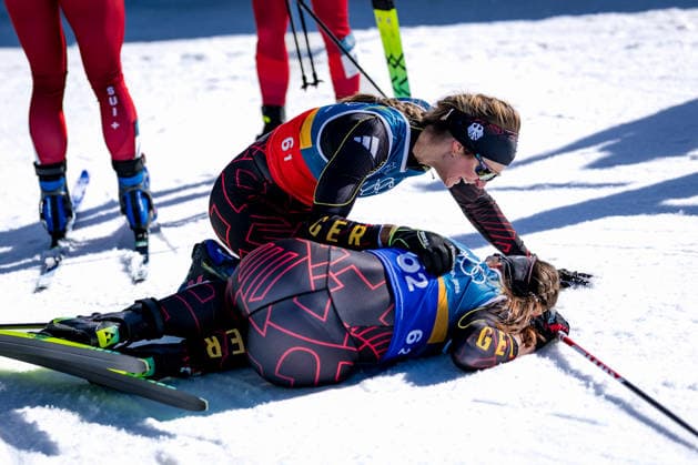 OLYMPICS - Winter Olympic Games, Olympische Spiele, Olympia, OS Milano Cortina 2026 TESERO,ITALY,18.FEB.26 - OLYMPICS, NORDIC SKIING, CROSS COUNTRY SKIING - Winter Olympic Games Milano Cortina 2026, team sprint free, men, women, final. Image shows the rejoicing of Laura Gimmler and Coletta Rydzek (GER).  GEPAxpictures xMatthiasxTrinkl