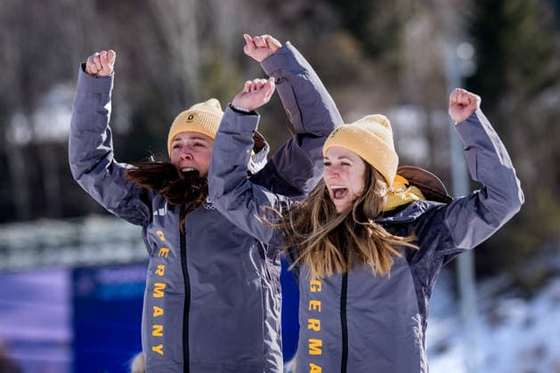 OLYMPICS - Winter Olympic Games, Olympische Spiele, Olympia, OS Milano Cortina 2026 TESERO,ITALY,18.FEB.26 - OLYMPICS, NORDIC SKIING, CROSS COUNTRY SKIING - Winter Olympic Games Milano Cortina 2026, team sprint free, men, women, final, medal ceremony. Image shows Coletta Rydzek and Laura Gimmler (GER).  GEPAxpictures xMatthiasxTrinkl