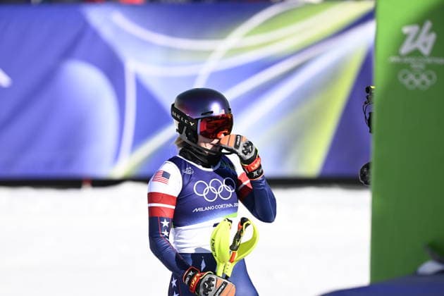 CORTINA, ITALY 20260218 USA s Mikaela Shiffrin is hugged after winning gold by Sweden s Anna Swenn-Larsson, who won bronze, and Switzerland s Camille Rast, who won silver, during the second run of the women s slalom in Cortina during the Winter Olympics in Milan Cortina, Italy. *** The image is included in the SPORTS PACKAGE. For others PAYMENT IMAGE *** CORTINA ITALY x10050x *** CORTINA, ITALY 20260218 USA s Mikaela Shiffrin is hugged after winning gold by Sweden s Anna Swenn Larsson, who won bronze, and Switzerland s Camille Rast, who won silver, during the second run of the women s slalom in Cortina during the Winter Olympics in Milan Cortina, Italy The image is included in the SPORTS PACKAGE For others PAYMENT IMAGE CORTINA ITALY x10050x  Copyright: xPontusxLundahl TTx 2026 OLYMPICS ALPINE WOMEN S SLALOM