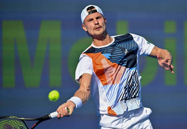ATP, Tennis Herren QATAR EXXONMOBIL OPEN-ROUND OF Marton Fucsovics of Hungary competes against Karen Khachanov of Russia during their men s singles round of 16 match at the ATP Qatar Exxonmobil Open 2026 tennis tournament at the Khalifa International Tennis Complex in Doha, Qatar, on February 18, 2026. DOHA Qatar Copyright: xNOUSHADx