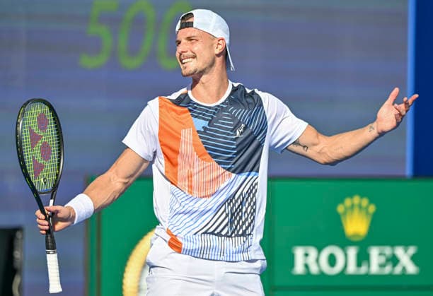 ATP, Tennis Herren QATAR EXXONMOBIL OPEN-ROUND OF Marton Fucsovics of Hungary competes against Karen Khachanov of Russia during their men s singles round of 16 match at the ATP Qatar Exxonmobil Open 2026 tennis tournament at the Khalifa International Tennis Complex in Doha, Qatar, on February 18, 2026. DOHA Qatar Copyright: xNOUSHADx