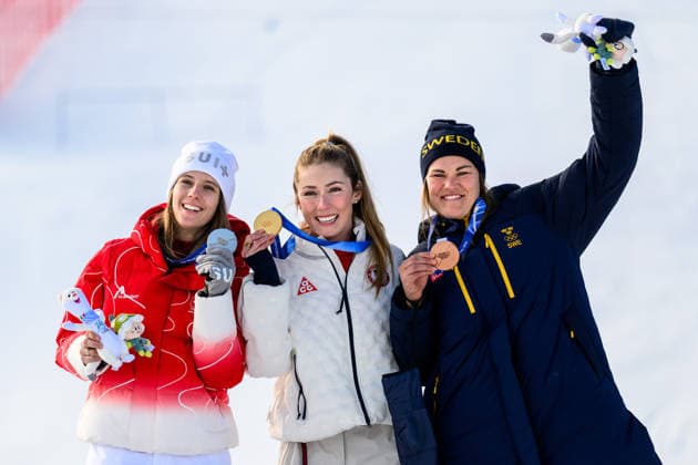 260218 Camille Rast of Switzerland, Mikaela Shiffrin of USA and Anna Swenn Larsson of Sweden on the podium after competing in women s alpine skiing slalom during day 12 of the 2026 Winter Olympics on February 18, 2026 in Cortina. Photo: Joel Marklund BILDBYRAN kod JM JM0797 bbeng alpint alpine skiing Olympic Games, Olympische Spiele, Olympia, OS olympics winter olympics os ol olympiska spel vinter-os olympiske leker milano cortina 2026 milan cortina 2026 milano cortina 2026 olympic games milano cortina 2026 winter olympic games milano cortina-os milano cortina-ol vinter-ol slalam dam sweden sverige *** 260218 Camille Rast of Switzerland, Mikaela Shiffrin of USA and Anna Swenn Larsson of Sweden on the podium after competing in women s alpine skiing slalom during day 12 of the 2026 Winter Olympics on February 18, 2026 in Cortina Photo Joel Marklund BILDBYRAN kod JM JM0797 bbeng alpint alpine skiing olympic games olympics winter olympics os ol olympiska spel vinter os olympiske leker milano cortina 2026 milan cortina 2026 milano cortina 2026 olympic games milano cortina 2026 winter olympic games milano cortina os milano cortina ol vinter ol slalam dam sweden sverige  Copyright: JOELxMARKLUND BB260218JM180