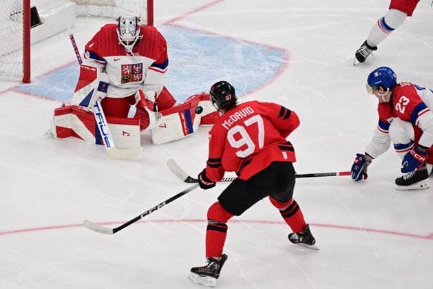 XXV Winter Olympic Games, Olympische Spiele, Olympia, OS in Milan, Italy, on February 18, 2026. Men s Ice hockey, Eishockey preliminary round playoffs, Czech Republic vs. Canada. From left Czech Republic goalie Lukas Dostal and, Connor McDavid of Canada in action. (CTKxPhoto MichalxKamaryt) CTKPhotoP2026021807754  CTKPhotoP2026021807754