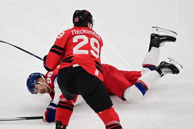 XXV Winter Olympic Games, Olympische Spiele, Olympia, OS in Milan, Italy, on February 18, 2026. Men s Ice hockey, Eishockey preliminary round playoffs, Czech Republic vs. Canada. From left Czech Martin Necas, Nathan MacKinnon of Canada. (CTKxPhoto MichalxKamaryt) CTKPhotoP2026021807803  CTKPhotoP2026021807803