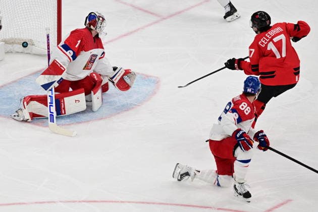 XXV Winter Olympic Games, Olympische Spiele, Olympia, OS in Milan, Italy, on February 18, 2026. Men s Ice hockey, Eishockey preliminary round playoffs, Czech Republic vs. Canada. From left Czech goalie Lukas Dostal receives goal, Macklin Celebrini of Canada scores, Czech David Pastrnak in action. (CTKxPhoto MichalxKamaryt) CTKPhotoP2026021807829  CTKPhotoP2026021807829