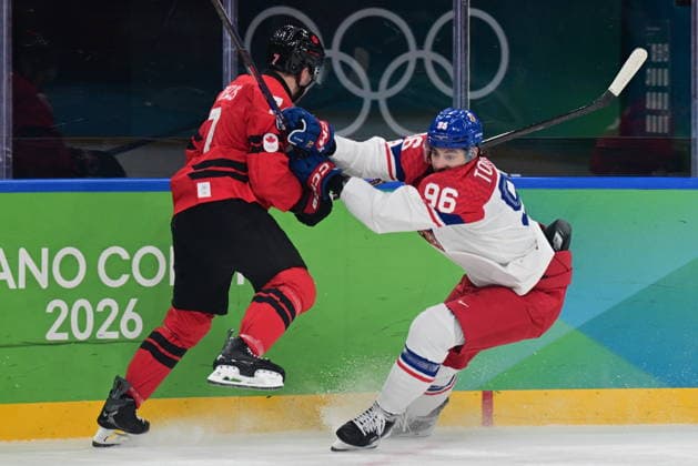 XXV Winter Olympic Games, Olympische Spiele, Olympia, OS in Milan, Italy, on February 18, 2026. Men s Ice hockey, Eishockey preliminary round playoffs, Czech Republic vs. Canada. From left Devon Toews of Canada, David Tomasek of Czech Republic. (CTKxPhoto MichalxKamaryt) CTKPhotoP2026021808806  CTKPhotoP2026021808806