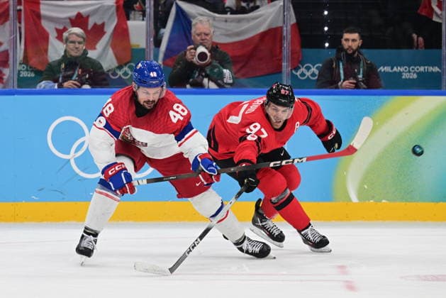 XXV Winter Olympic Games, Olympische Spiele, Olympia, OS in Milan, Italy, on February 18, 2026. Men s Ice hockey, Eishockey preliminary round playoffs, Czech Republic vs. Canada. From left Czech Tomas Hertl, Connor McDavid of Canada. (CTKxPhoto MichalxKamaryt) CTKPhotoP2026021809353  CTKPhotoP2026021809353