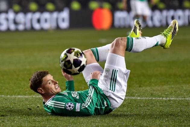 Harvey Barnes of Newcastle United Football Club watches the ball as he falls over Qarabag v Newcastle United, UEFA Champions League, Knockout Round Play-Offs, First Leg, Football, Tofig Bahramov Republican Stadium, Baku, Azerbaijan - 18 Feb 2026Baku Tofig Bahramov Republican Stadiu Azerbaijan EDITORIAL USE ONLY No use with unauthorised audio, video, data, fixture lists, club league logos or live services. Online in-match use limited to 120 images, no video emulation. No use in betting, games or single club league player publications.  Copyright: xElmirxKarimov Shutterstockx 16660416ag
