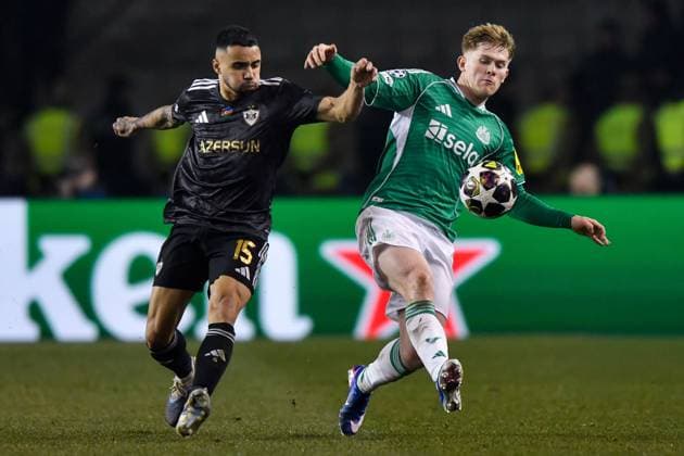 Lewis Hall of Newcastle United Football Club clears the ball after pressure from Leandro Andrade of Qarabag FK Qarabag v Newcastle United, UEFA Champions League, Knockout Round Play-Offs, First Leg, Football, Tofig Bahramov Republican Stadium, Baku, Azerbaijan - 18 Feb 2026Baku Tofig Bahramov Republican Stadiu Azerbaijan EDITORIAL USE ONLY No use with unauthorised audio, video, data, fixture lists, club league logos or live services. Online in-match use limited to 120 images, no video emulation. No use in betting, games or single club league player publications.  Copyright: xElmirxKarimov Shutterstockx 16660416ai