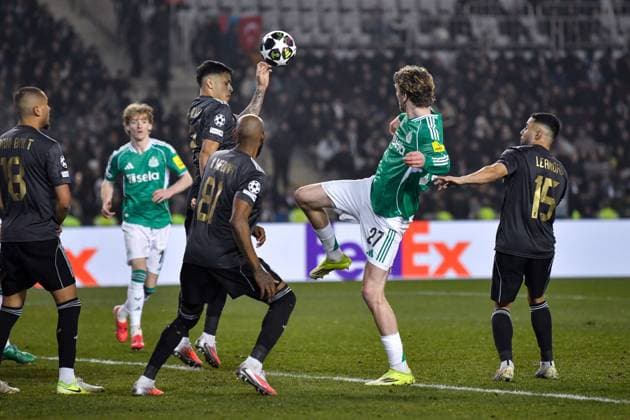 Nick Woltemade of Newcastle United Football Club kicks the ball and onto theMatheus Silva of Qarabag FK hand Qarabag v Newcastle United, UEFA Champions League, Knockout Round Play-Offs, First Leg, Football, Tofig Bahramov Republican Stadium, Baku, Azerbaijan - 18 Feb 2026Baku Tofig Bahramov Republican Stadiu Azerbaijan EDITORIAL USE ONLY No use with unauthorised audio, video, data, fixture lists, club league logos or live services. Online in-match use limited to 120 images, no video emulation. No use in betting, games or single club league player publications.  Copyright: xElmirxKarimov Shutterstockx 16660416ba