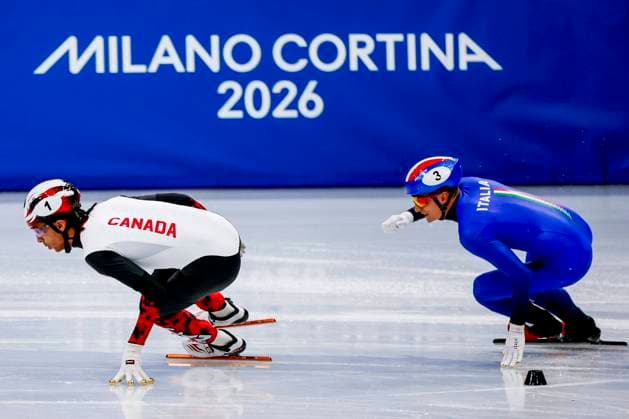 William Dandjinou of Canada and Pietro Sighel of Italy Men s 500m Quarterfinals, Milano Cortina 2026 Winter Olympics: Day 12, Short Track Speed skating, Eisschnelllauf - Milano Cortina 2026 Winter Olympics: Day 12, Milano Speed Skating Stadium, February 18, 2026, Milan, Italy.
