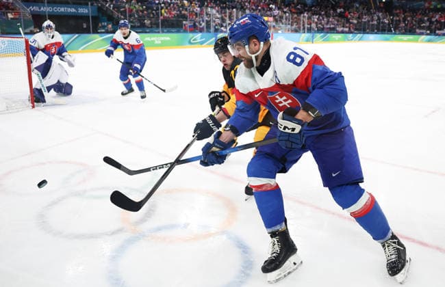 (260218) -- MILAN, Feb. 18, 2026 -- Erik Cernak (front) of Slovakia competes during the Ice hockey, Eishockey men s play-offs quarterfinal between the Slovakia and Germany at the Milan-Cortina 2026 Olympic Winter games, Winterspiele,Spiele, Summer games in Milan, Italy, Feb. 18, 2026. ) (MICO2026)ITALY-MILAN-OLYMPIC WINTER GAMES-ICE HOCKEY-MEN-PLAY-OFFS QUARTERFINALS-SVK VS GER WangxKaiyan 