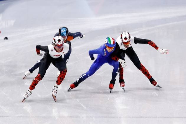 MILAN , 18-02-2026 , Milano Ice Skating Arena , Olympic Winter games, Winterspiele,Spiele, Summer games 2026 - Short Track 18-02 Men™s 500m Semifinals , Picture shows William Dandjinou, Melle van t Wout, Pietro Sighel, Maxime Laoun Olympic Winter Games 2026 - Short Track 18-02  x201713409x Copyright: