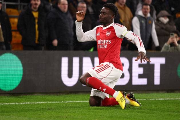 Bukayo Saka of Arsenal scores to make it 0-1 and celebrates Wolverhampton Wanderers v Arsenal, Premier League, Football, Molineux, Wolverhampton, UK - 18 Feb 2026Wolverhampton Molineux United Kingdom EDITORIAL USE ONLY No use with unauthorised audio, video, data, fixture lists, club league logos or live services. Online in-match use limited to 120 images, no video emulation. No use in betting, games or single club league player publications. Copyright: xRyanxBrowne Shutterstockx 16660426az